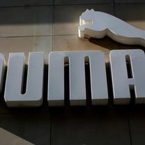 Puma narrows FY core profit outlook