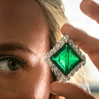 Aga Khan emerald fetches record $9 mn in Geneva auction