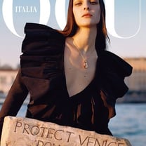 Vogue Italia dedicates cover to Protect Venice; with model holding bank account details